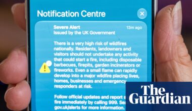 Alarmed by the alarm: people react to ‘severe alert’ on phones over UK wildfires | Wildfires