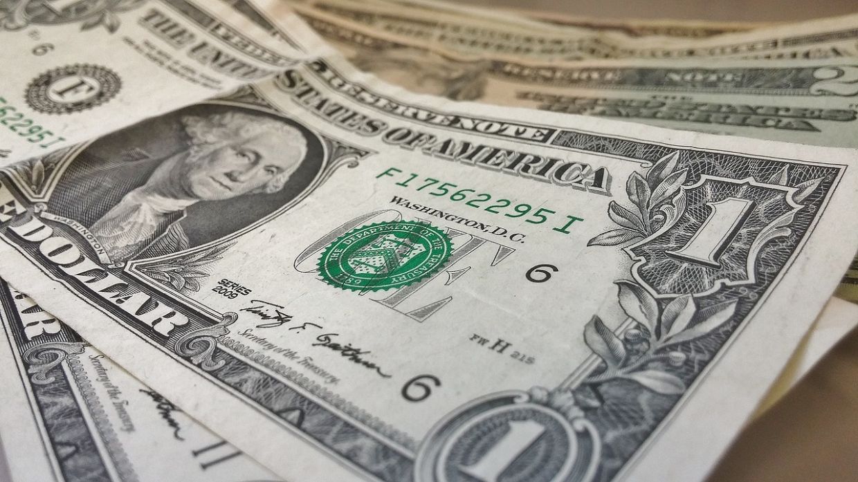 Dollar steadies after payrolls drop, inflation data eyed