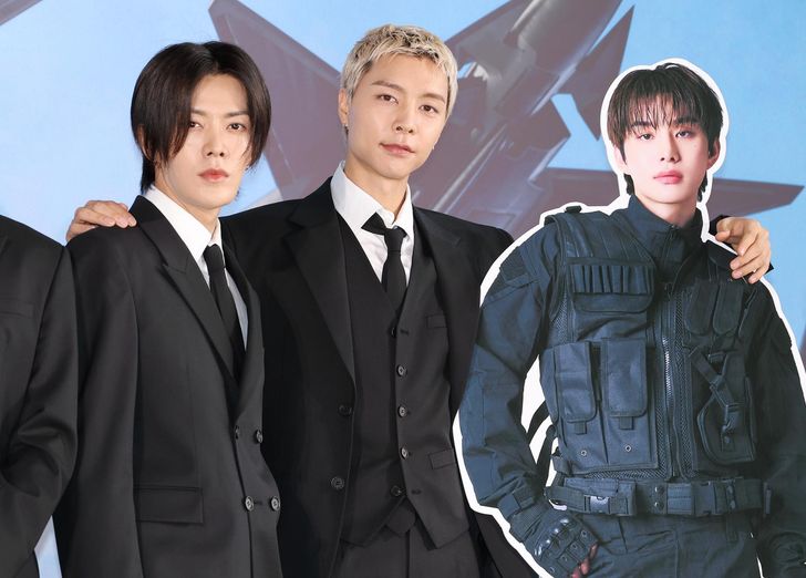 From left, Yuta and Johnny of boy band NCT 127 pose with a standee of bandmate Jungwoo during a press conference at SKY31 in Seoul's Songpa District, Monday, marking the release of the group's seventh full-length album, 'BLINGY.' Yonhap