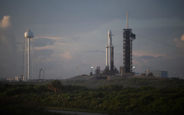 NASA’s Nancy Grace Roman Space Telescope, encapsulated in a protective payload fairing atop a SpaceX Falcon Heavy rocket, is seen at sunrise, Saturday, Aug. 29, 2026, at Launch Complex 39A at NASA’s Kennedy Space Center in Florida.