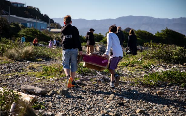 Tawatawa–Ridgway School students installing their Kororā houses in Ōwhiro Bay