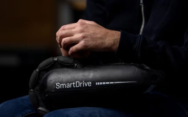 Shane Hryhorec travels with an attachable motor to provide his wheelchair added mobility.