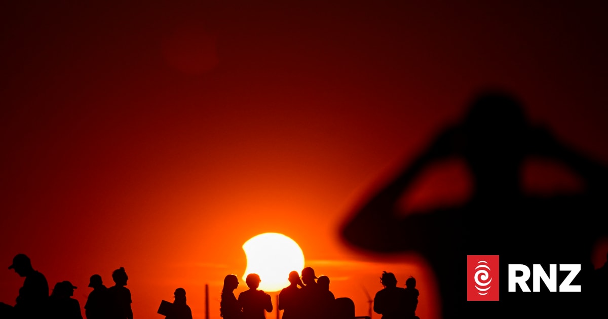 Watch: Skies darken as solar eclipse heads south from Arctic to Spain