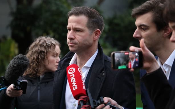 National MP Chris Penk arrives at Parliament ahead of urgent Caucus meeting on 12 August.