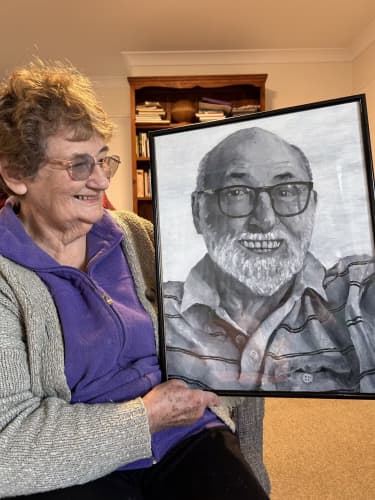 Lois Clarkson holds a drawing that her grandson, Thomas Clarkson, created of his grandfather, and diabetic, Colin Clarkson. Photo / Belinda Feek