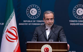 In this handout photograph taken and released on January 30, 2026 by the Turkish Foreign Ministry press service Iran's Foreign Minister Abbas Araqchi speaks during a joint press conference with his Turkish counterpart following their meeting in Istanbul. Iran's foreign minister was in Turkey today as Ankara led a diplomatic push to mediate between Tehran and Washington, after US President cooled threats of an imminent strike on the Islamic republic. (Photo by Handout / TURKISH FOREIGN MINISTRY / AFP) / RESTRICTED TO EDITORIAL USE - MANDATORY CREDIT "AFP PHOTO / TURKISH FOREIGN MINISTRY" - NO MARKETING - NO ADVERTISING CAMPAIGNS - DISTRIBUTED AS A SERVICE TO CLIENTS