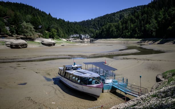 The parched bed of Brenets Lake, part of the Doubs River, in Les Brenets, Switzerland on July 28.