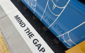 Signage on the Auckland rail network.