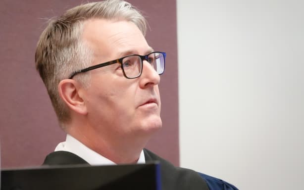 Coroner Matthew Bates apologised to Erica Hume's family about delays in the inquest. Erica Hume died in a suspected suicide when she was a Palmerston North Hospital mental health ward patient.