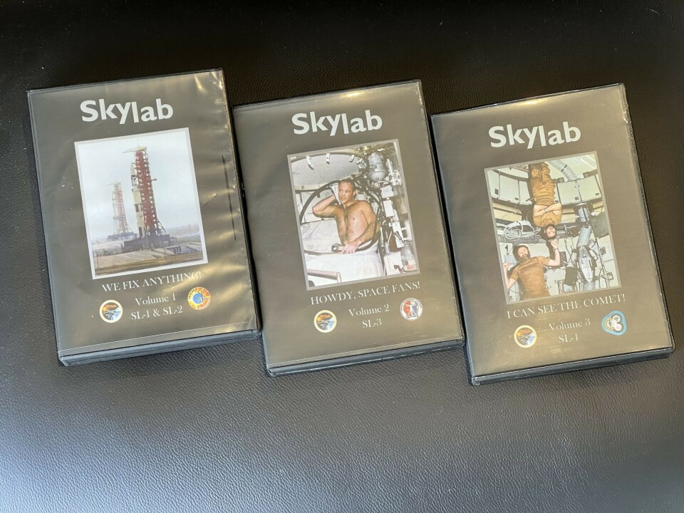 Three DVD cases documenting NASA's Skylab and its missions