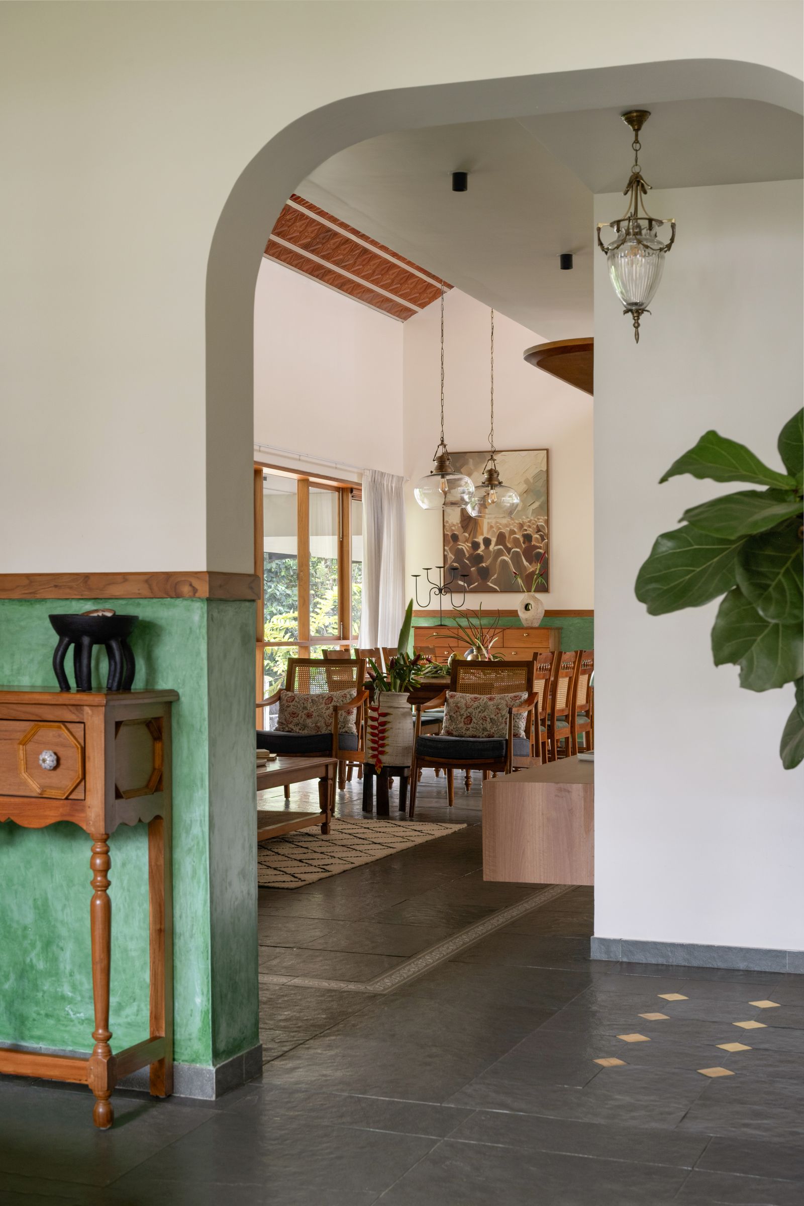 Image may contain Floor Arch Architecture Indoors Interior Design Building Dining Room Dining Table and Furniture