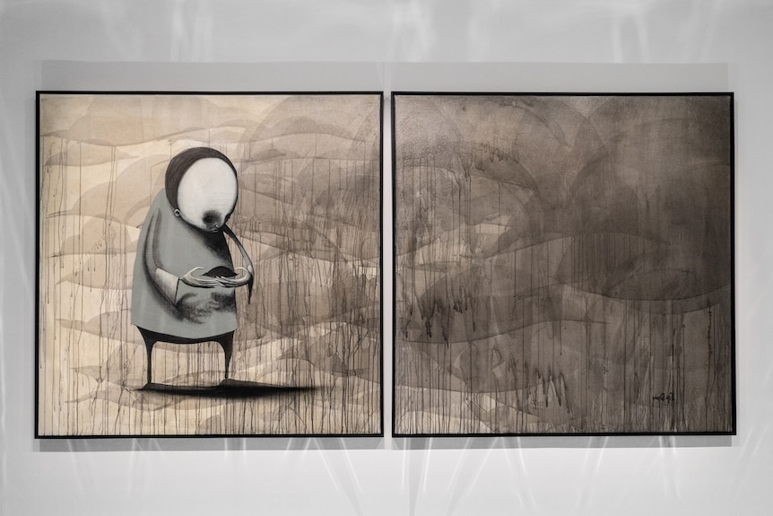 A piece of abstract art in black and white showing a lonely-looking figure