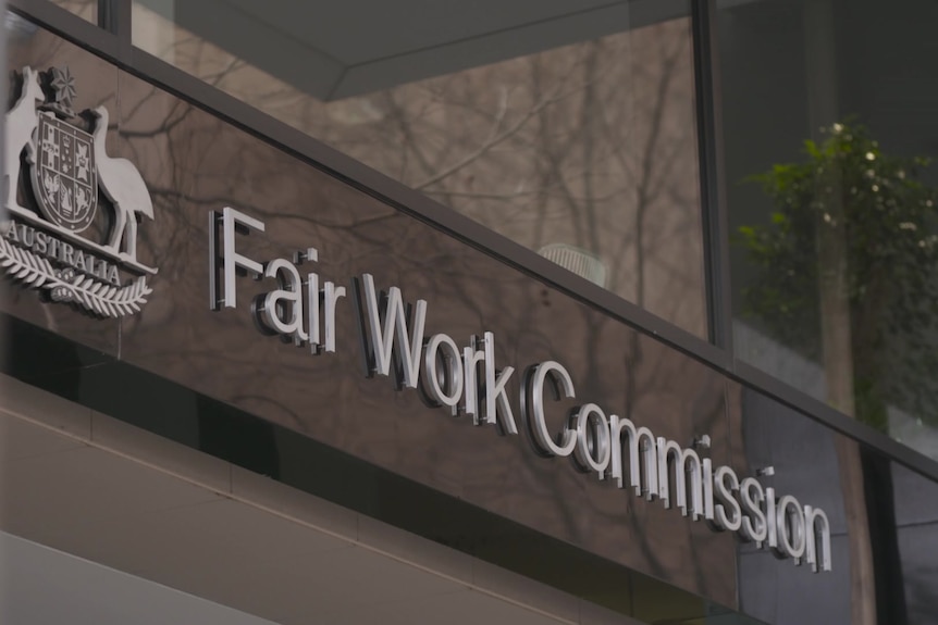 A sign with the words Fair Work Commission