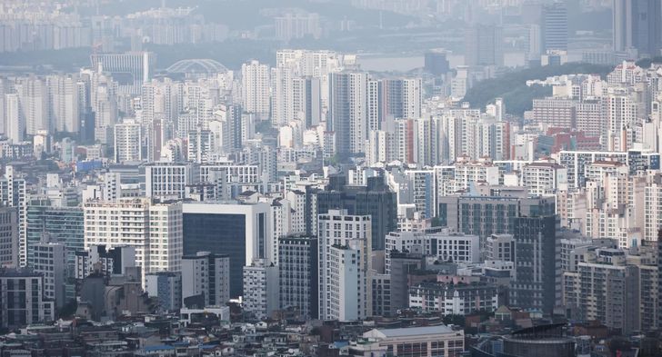 Apartment buildings are seen in Seoul from Namsan, July 19. Yonhap