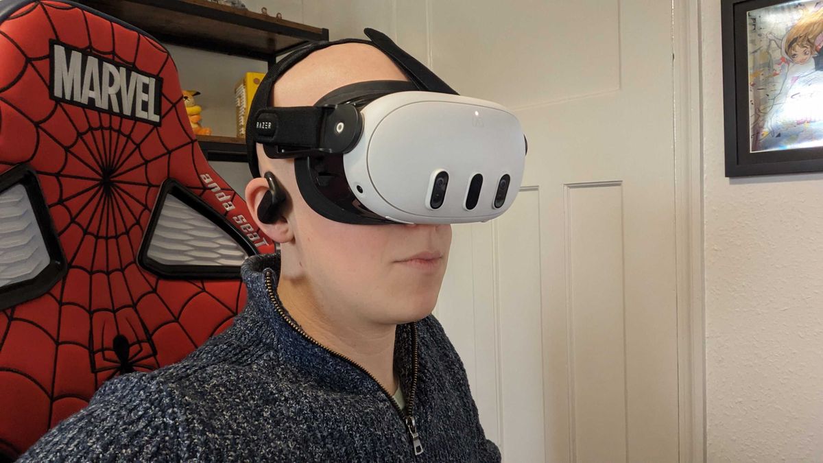 Hamish Hector wearing the Meta Quest 3 with the Razer attachments on