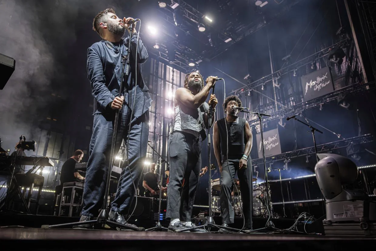 Singapore bans two Massive Attack members after pro-Palestinian display at concert - Stuff