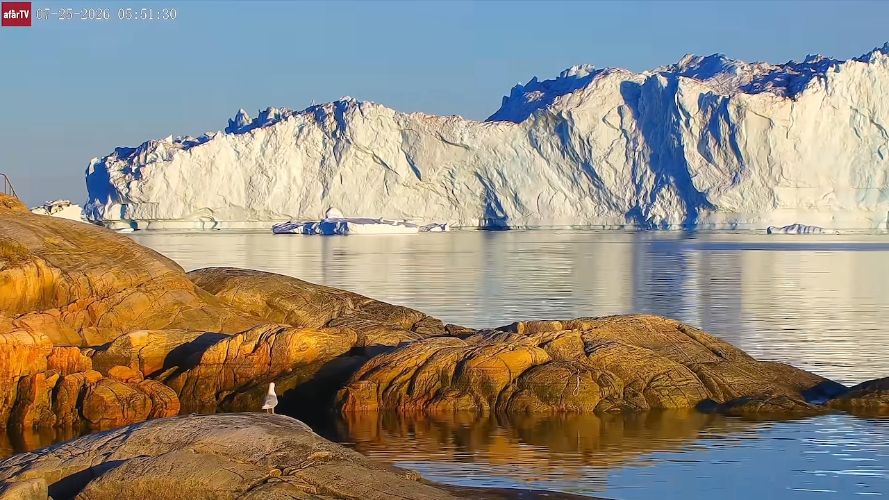 Colossal Iceberg Flips Over in Ilulissat, Greenland