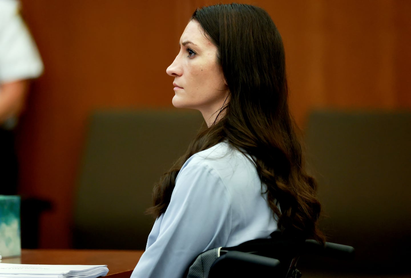 Lindsay  Clancy, listens, to Judge William F. Sullivan addressing the court at her murder trial.