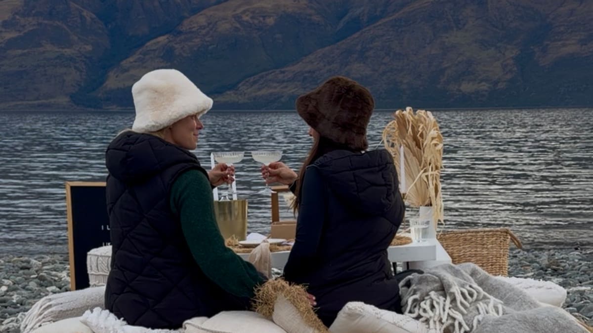 Paige Hareb proposes to Cait Scullin beneath two rainbows in Queenstown