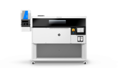 Front view of the HP MJF 1200 3D Printer with material tank attached. Image via HP.
