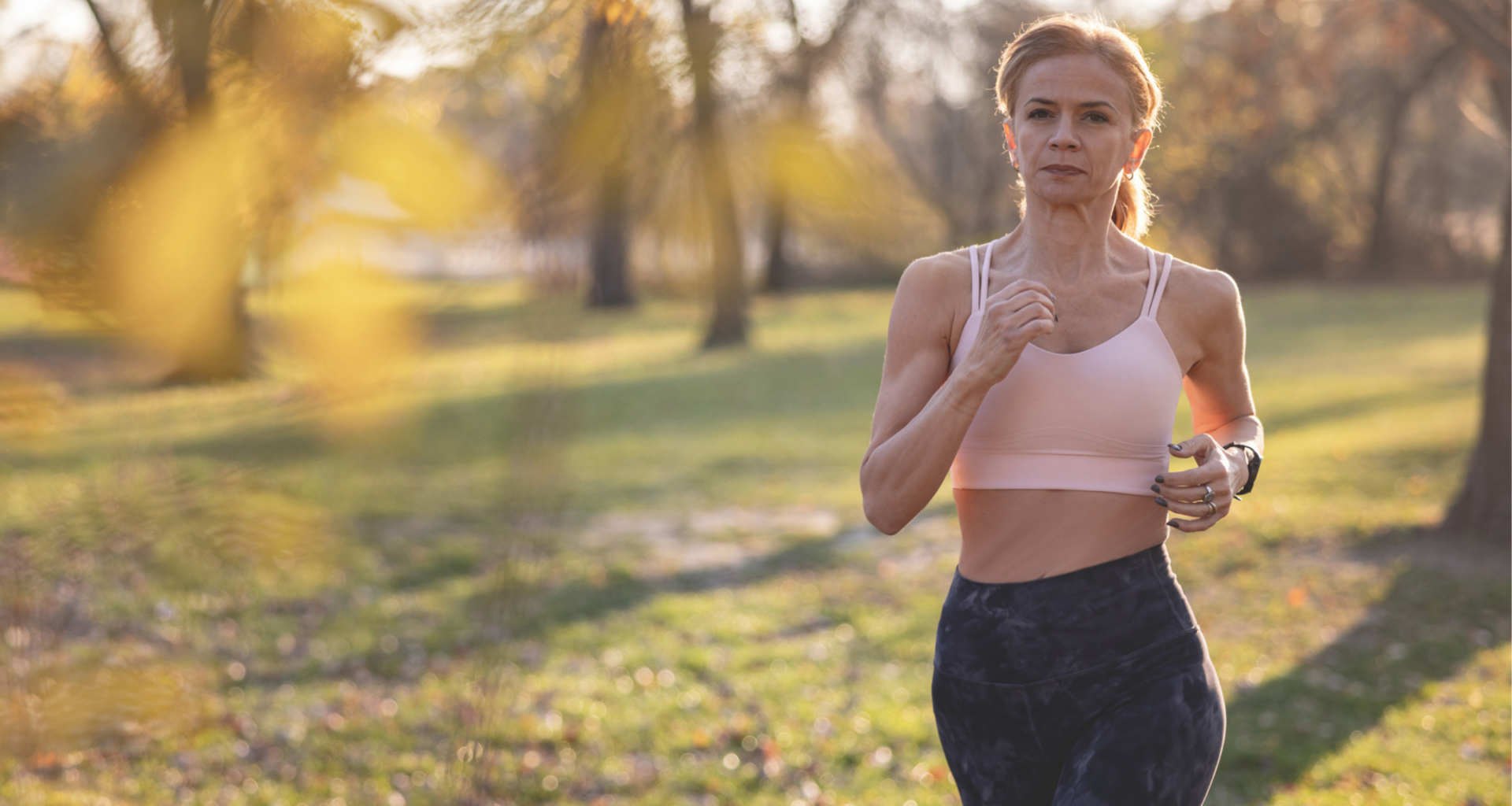 a woman runs and looks serious