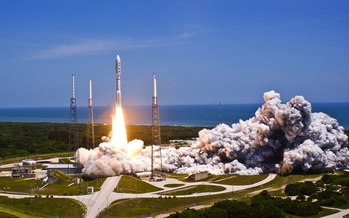 A United Launch Alliance Atlas V rocket blasts off carrying NASA's Juno mission. The launch marks the second of five launches for NASA in 2011.