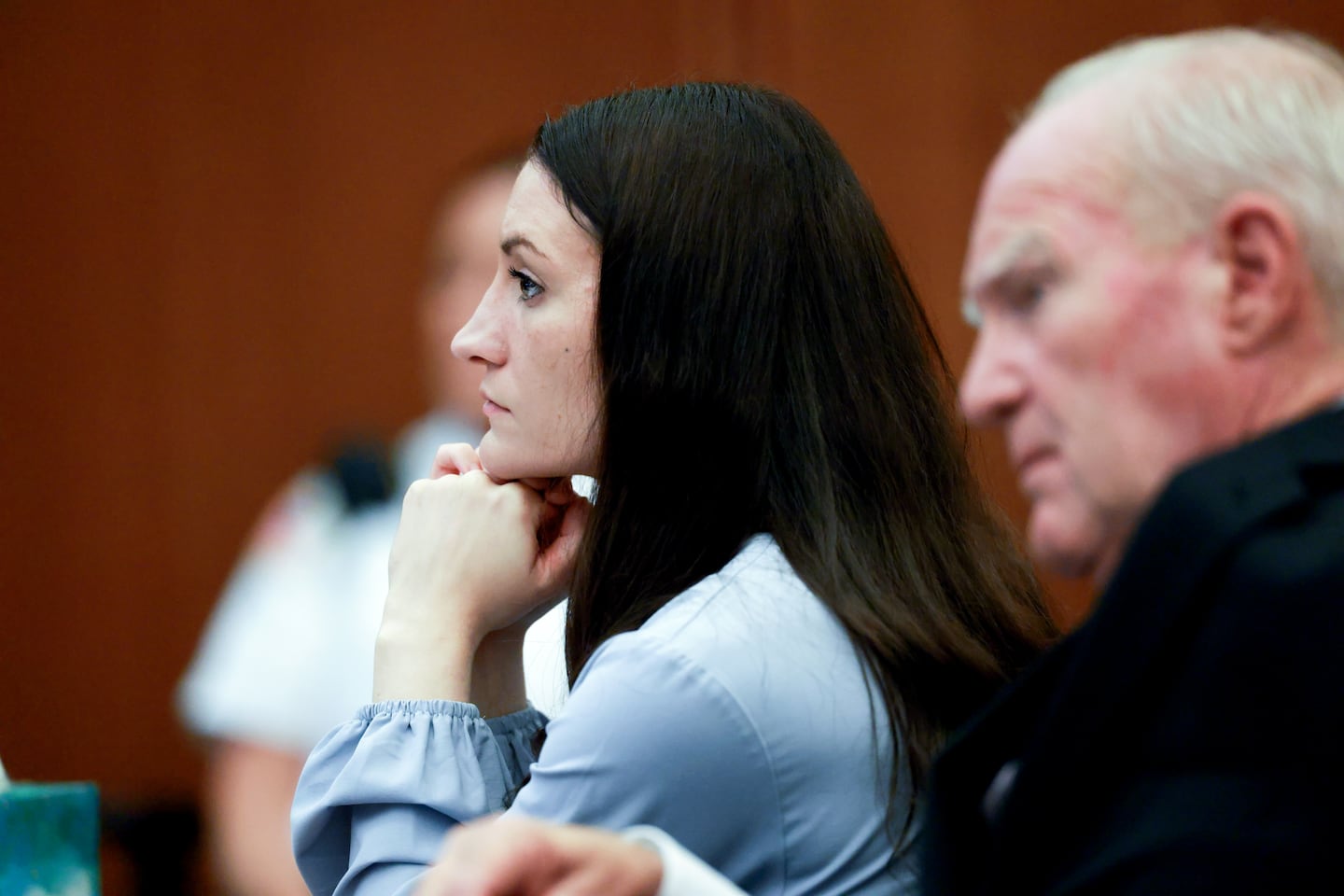 Lindsay  Clancy, and her Defense Attorney  Kevin Reddington,listen to testimony from Rebecca Jollotta, at Clancy's murder trial  in Plymouth MA on Tuesday August 11 2026. 