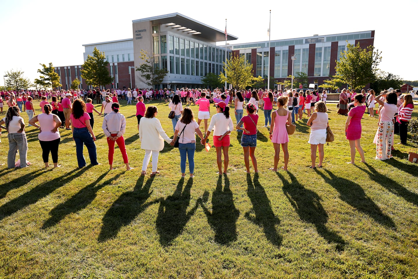 On Aug. 20, people advocating for better mental health services held hands as they gathered outside Plymouth Superior Court in support of Lindsay Clancy.