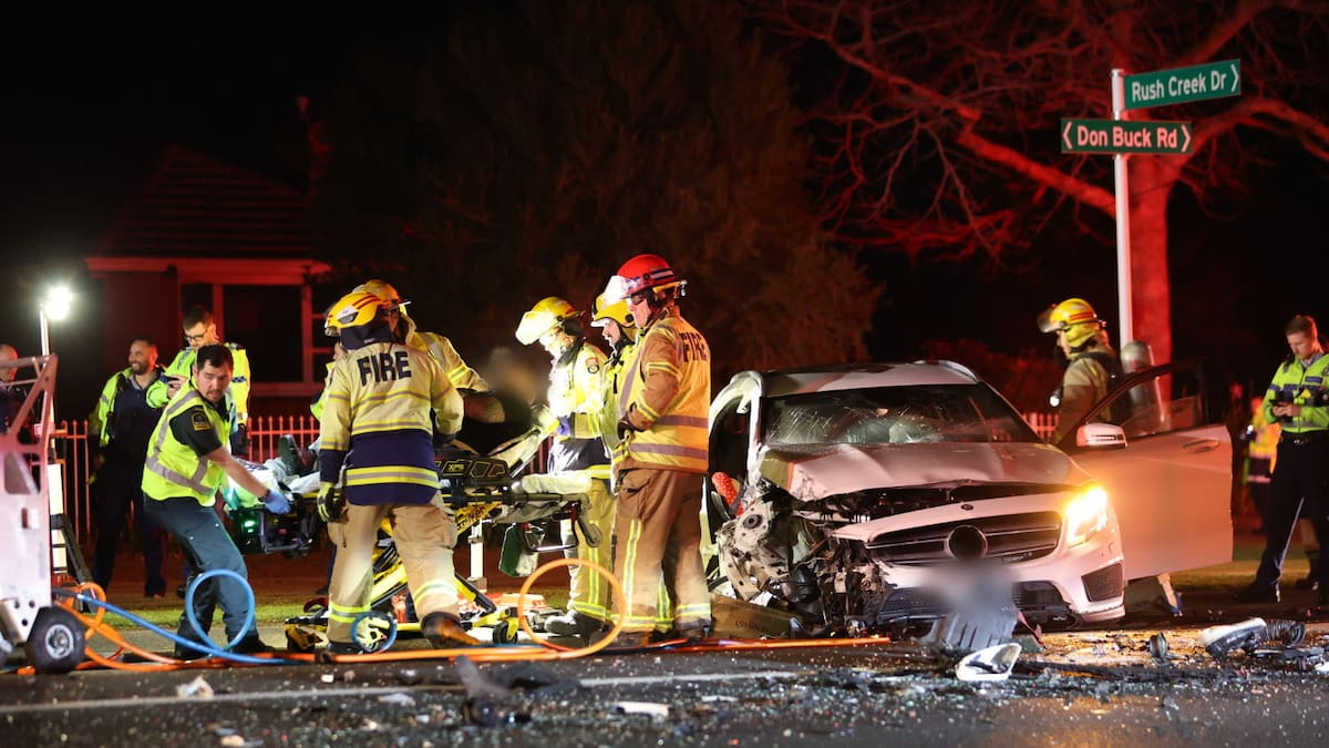 Serious crash on Don Buck Rd, West Auckland, as man rescued from wrecked car