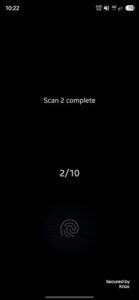 One UI 9.5 fingerprint enrollment part-way through, the fingerprint graphic filling in as scans complete