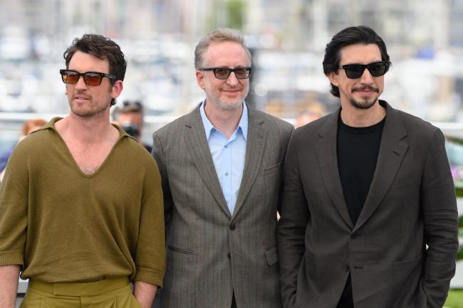 (L-R) Adam Driver and James Gray and Miles Teller at the 79th Festival de Cannes held at Palais des Festivals on May 17, 2026 in Cannes, France.