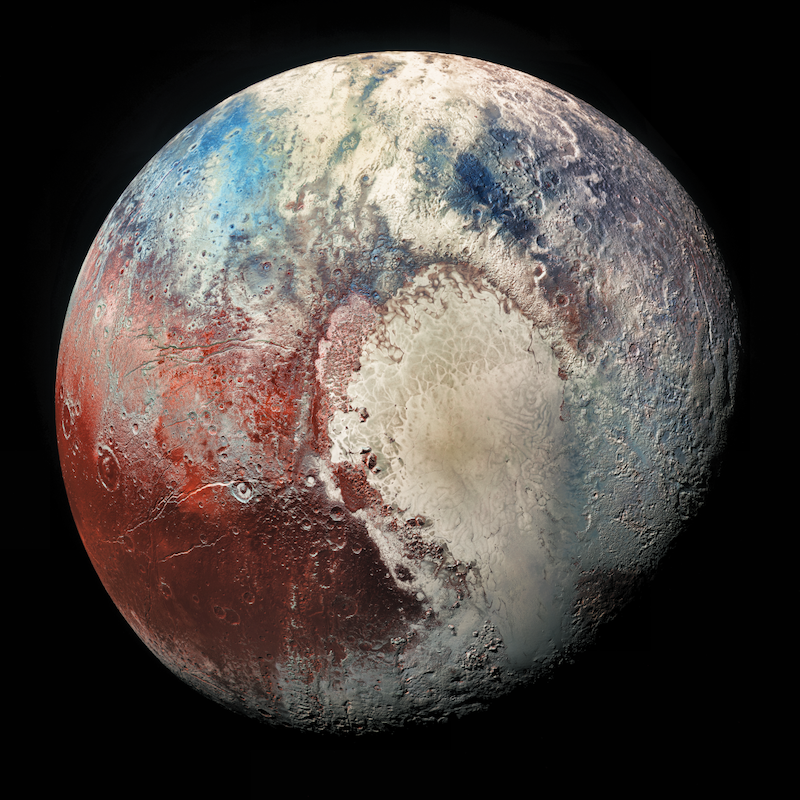 Multi-colored rocky planet with mountains, plains and craters.