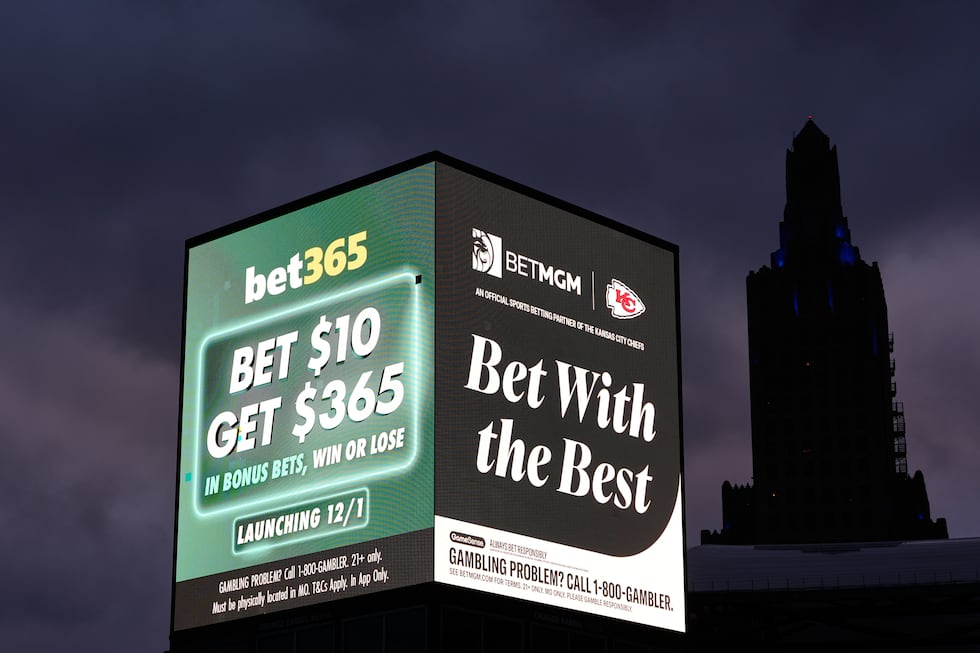 FILE - Advertisements for sports betting apps are seen in downtown Kansas City, Mo., Nov. 29,...