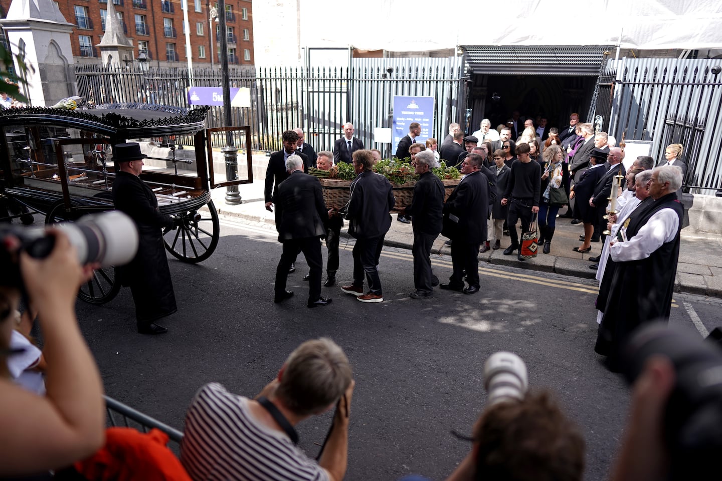 The coffin of Glen Hansard departs from St Patrick's Cathedral on Thursday in Dublin, Ireland.