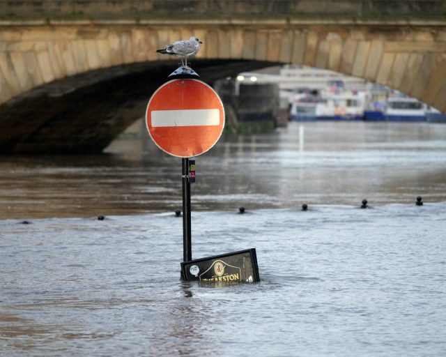 YORK, ENGLAND - DECEMBER 10: An general view of the River Ouse and water flooding riverside properties on December 10, 2025 in York, England. Flood warnings were issued on Tuesday along the River Ouse and River Derwent, where water levels were already high in the flood-prone region before the arrival of Storm Bram brought additional rainfall. (Photo by Christopher Furlong/Getty Images)