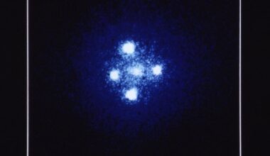 The Einstein Cross. Four images of a single quasar, split apart by the gravity of a galaxy twenty times closer to us. The diffuse glow at the centre is the lensing galaxy itself (Credit : NASA/ESA)