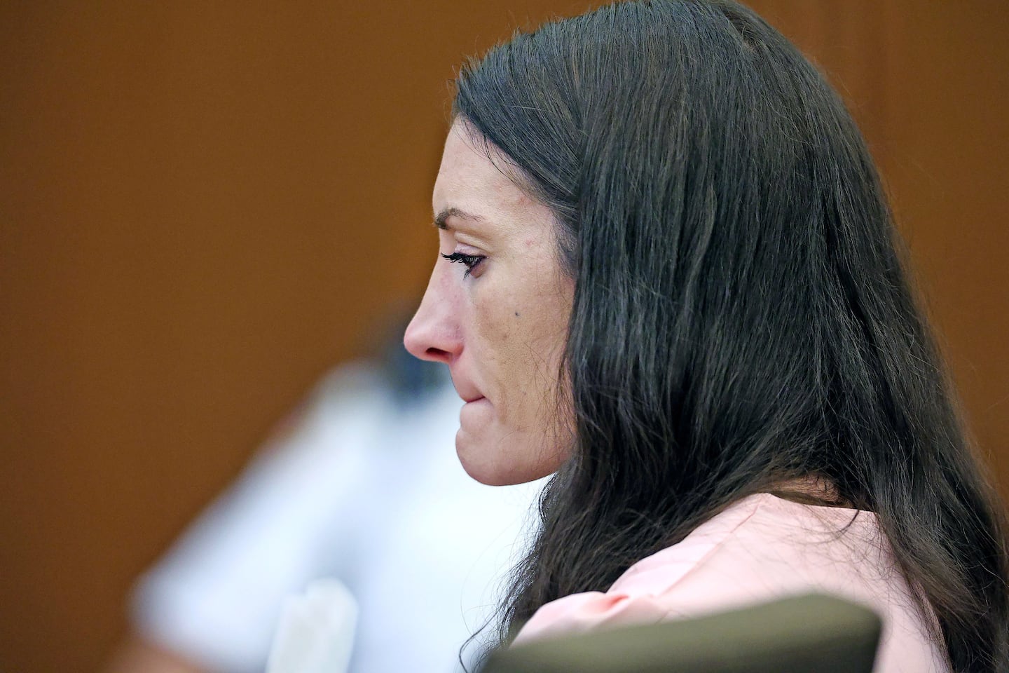 Defendant Lindsay Clancy listens to Dr. Jennifer Tufts on the witness stand during her murder trial at Plymouth Superior Court in Plymouth, Mass., Monday, Aug. 10, 2026. 