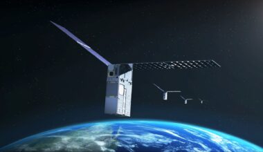 illustration of four small, boxy satellites flying above earth