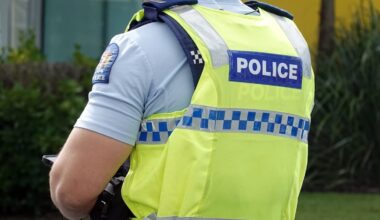 Police search Pāpāmoa property; people in handcuffs seen in Ashley Place