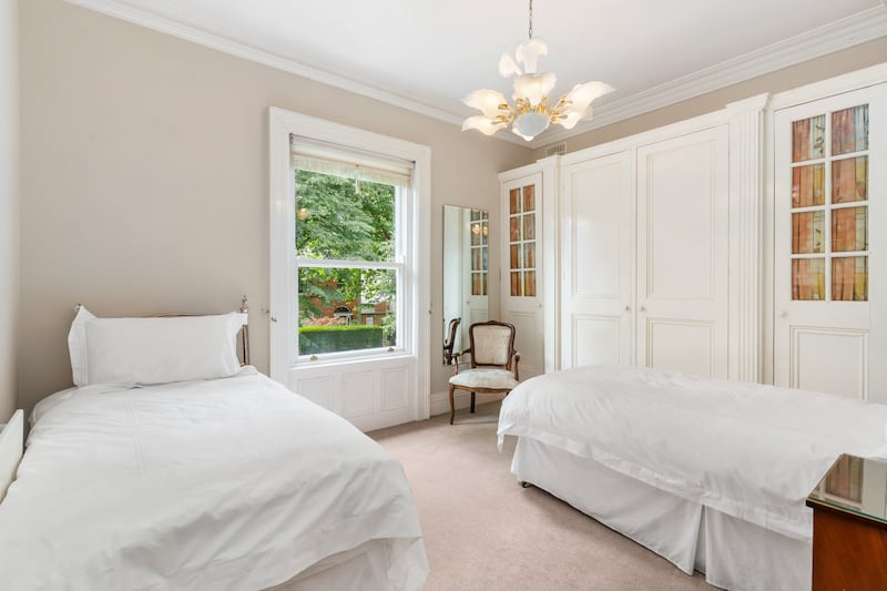 Bedroom with built-in replica Victorian wardrobe