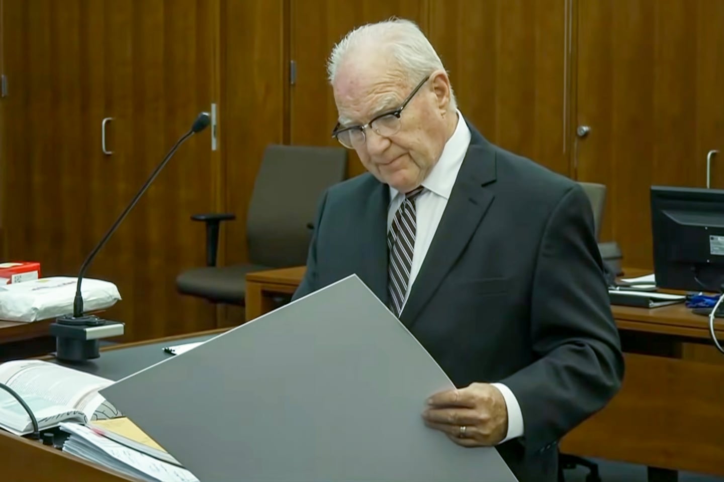 Kevin Reddington refers to a list of Lindsay Clancy's past medications during cross examination of Rebecca Jollotta on Day 11 of the Lindsay Clancy murder trial at Plymouth Superior Court in Plymouth, Monday, Aug. 11, 