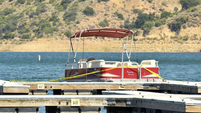 A boat is docked and roped off with police tape at Lake Piru, where actress Naya Rivera was reported missing Wednesday, on July 9, 2020 in Piru, California. 