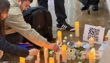 Dozens brave Auckland rain to honour Nepal flash flood victims