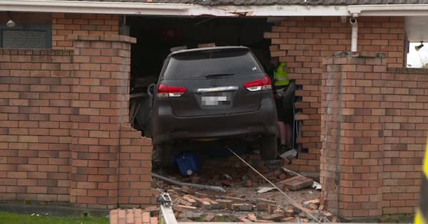 Stolen car smashes into Palmerston North home after police pursuit