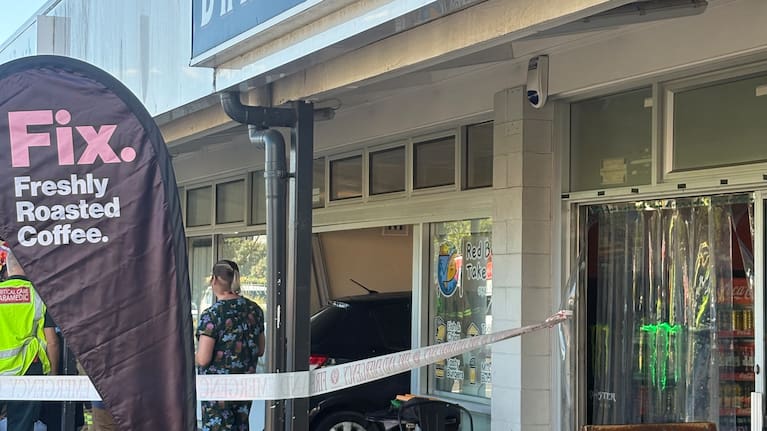 A car has crashed into a shop in Auckland's Red Beach. 