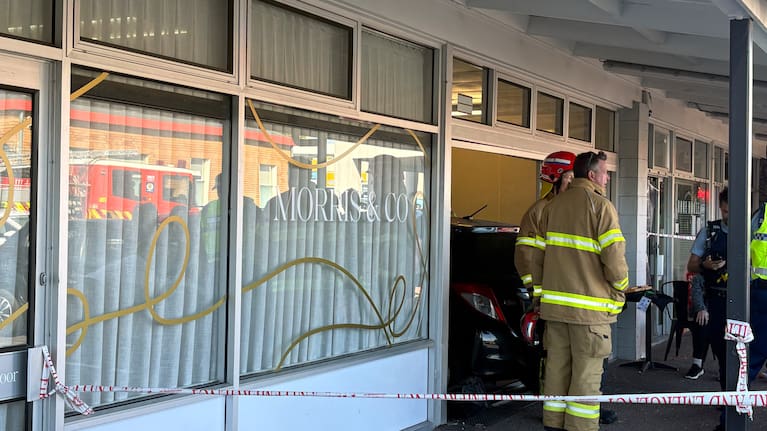 A car has crashed into a shop in Auckland's Red Beach. 