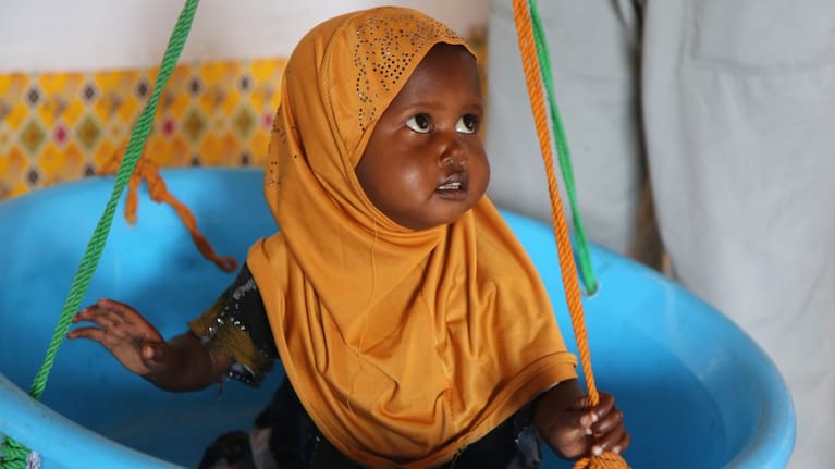 A child is weighed at Feynuus Nutrition Centre on the outskirts of the capital, Mogadishu, Somalia Wednesday, Aug. 19, 2026.