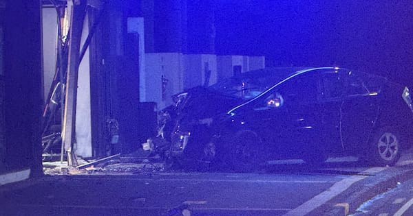 One in hospital after car crashes into building in Auckland