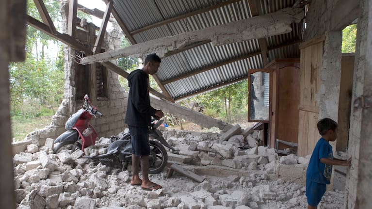 A building collapsed due to an earthquake, in Reok, East Nusa Tenggara province, Indonesia.