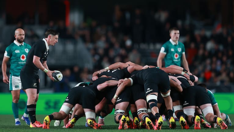All Blacks halfback Cam Roigard prepares to feed a scrum during his team's win over Ireland at Eden Park.